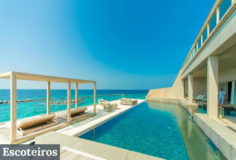 Architectural Photography of Gray Granite Swimming Pool and Outdoor Lounge at Beach Side