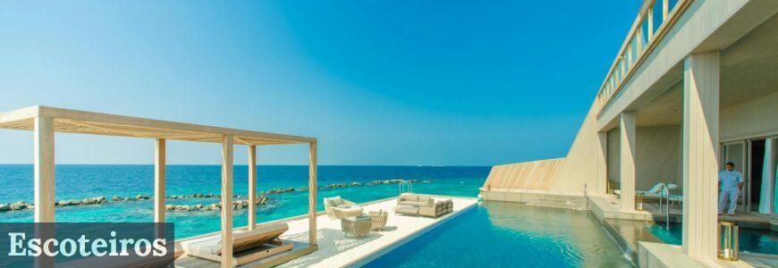 Architectural Photography of Gray Granite Swimming Pool and Outdoor Lounge at Beach Side