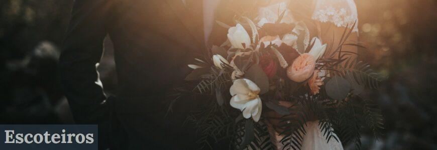 groom beside bride holding bouquet flowers